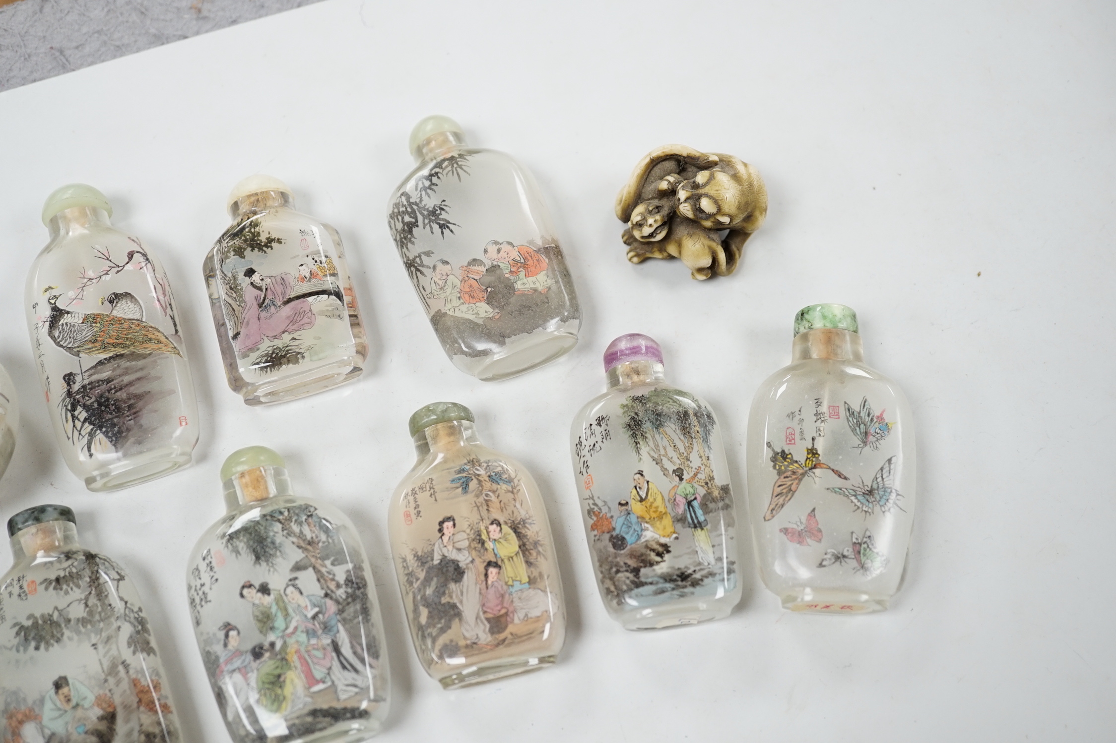 A small collection of Chinese reverse painted bottles